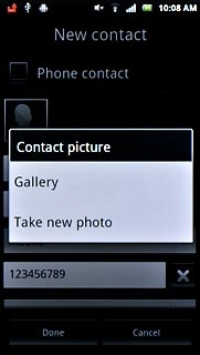 To take a new picture:Press Take new photo.