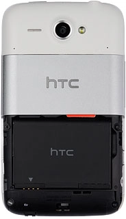 Take hold at the right side of the battery and remove it.