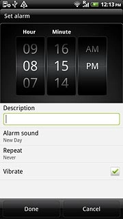 Slide the numbers up or down to set Hour and Minute.
