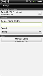 Press the field below Router name (SSID).Key in the required name.