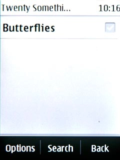 Go to the required audio file.Press the required audio file to tick it.