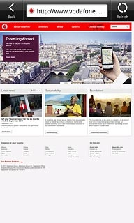 Press the address bar at the top of the display.