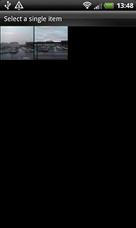 Go to the required folder.Press the required picture.