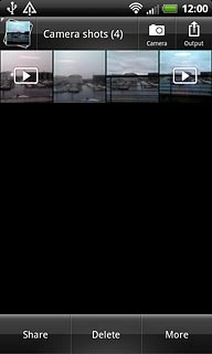 Go to the required folder.Press and hold the required picture or the required video clip until a pop-up menu is displayed.