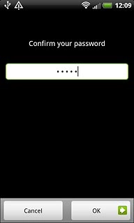 Key in the phone lock code again and press OK.