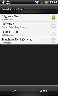 Once you've found an alarm tone you like, press OK.