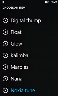 Press the playback icon next to the different ring tones to hear them.