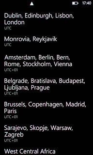 Press the required time zone.