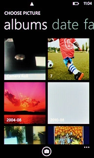 To take a new picture:Press the camera icon.