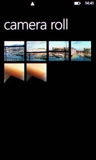 Go to the required folder.Press the required picture or the required video clip.