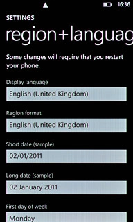 Press the field below Display language.