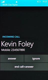 When you have an ongoing call, the new call is signalled by a sound.Press answer.The active call is put on hold and the other call is answered.