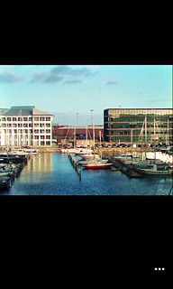 Press the dots in the bottom right corner of the display.