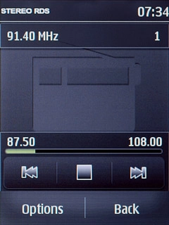 Press and hold double arrow right or double arrow left.The radio searches for channels in the selected direction and stops when a channel is found.