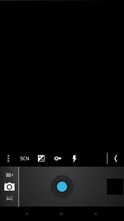 Press the middle dot at the bottom of the display to return to standby mode.
