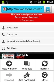 Press the address bar at the top of the display.
