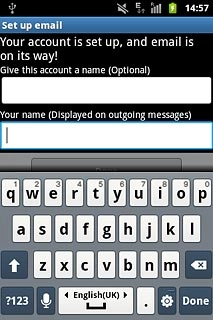 Press the field below Your name (Displayed on outgoing messages) and key in the required sender name.