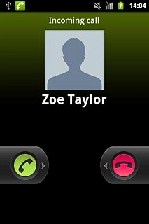 When you have an ongoing call, the new call is signalled by a sound.Press the accept call icon and drag the icon right.
