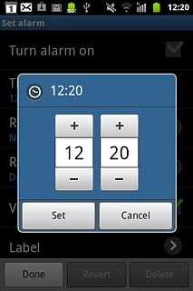 Press + or - next to hours and minutes to set the time.