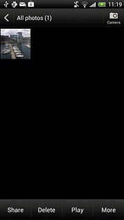 Go to the required folder.Press the required picture or the required video clip.