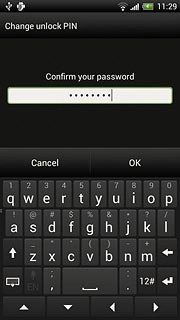 Key in the phone lock code again and press OK.