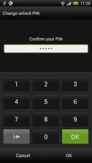 Key in the phone lock code again and press OK.