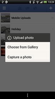To upload a saved picture:Press Choose from Gallery.