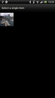 Go to the required folder.Press the required picture.