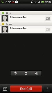 Press the required call to swap calls.