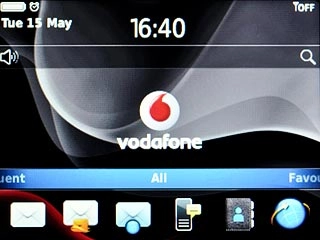 The alarm icon shows that the alarm is set.Further information:Set the alarm