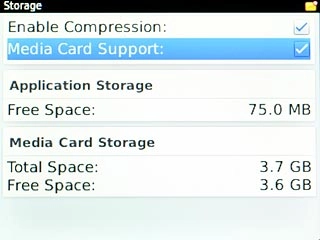 Scroll to Media Card Support and press the Navigation key to turn on use of memory card.