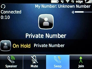 Scroll to Swap and press the Navigation key to swap calls.