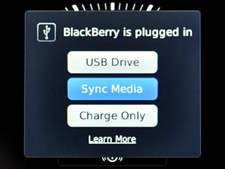 Scroll to Sync Media and press the Navigation key.