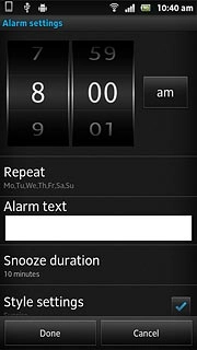 Slide hours and minutes up or down to set the time.