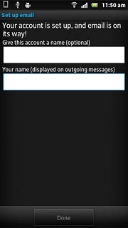 Press the field below Your name (displayed on outgoing messages) and key in the required sender name.