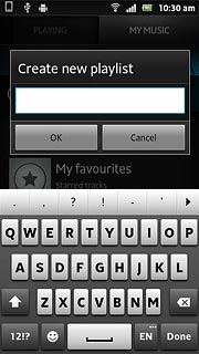 Press the text input field and key in a name for the playlist.