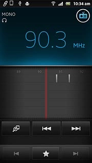 The radio searches for channels and the channels found are displayed on the dial.
