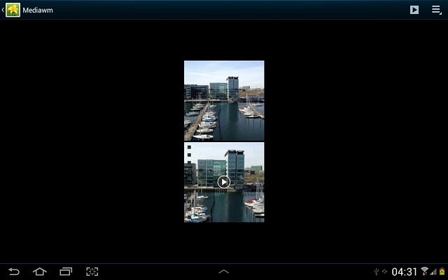 Go to the required folder.Press the required picture or the required video clip.