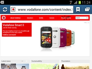 Press the address bar at the top of the display.