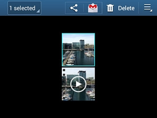When a picture or video clip is displayed in a a blue frame, it's selected.