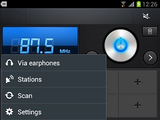 To turn off the speaker:Press Via earphones.