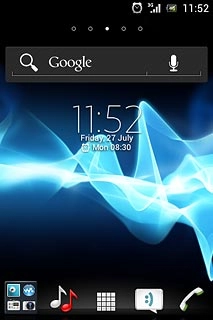 The alarm icon shows that the alarm is set.Further information:Set the alarm