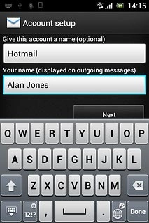 Press the field below Your name (displayed on outgoing messages) and key in the required sender name.