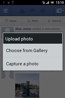 To upload a saved picture:Press Choose from Gallery.