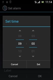 Slide hours and minutes up or down to set the time.