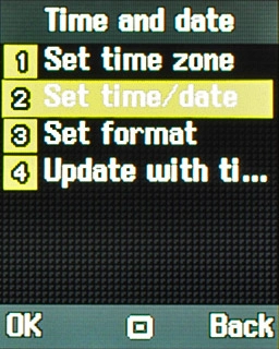Scroll to Set time/date and press the Navigation key.