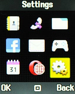 Scroll to Settings and press the Navigation key.