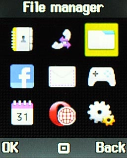 Scroll to File manager and press the Navigation key.
