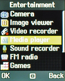Scroll to Media player and press the Navigation key.