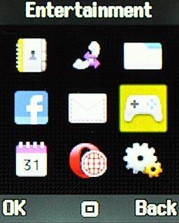 Scroll to Entertainment and press the Navigation key.